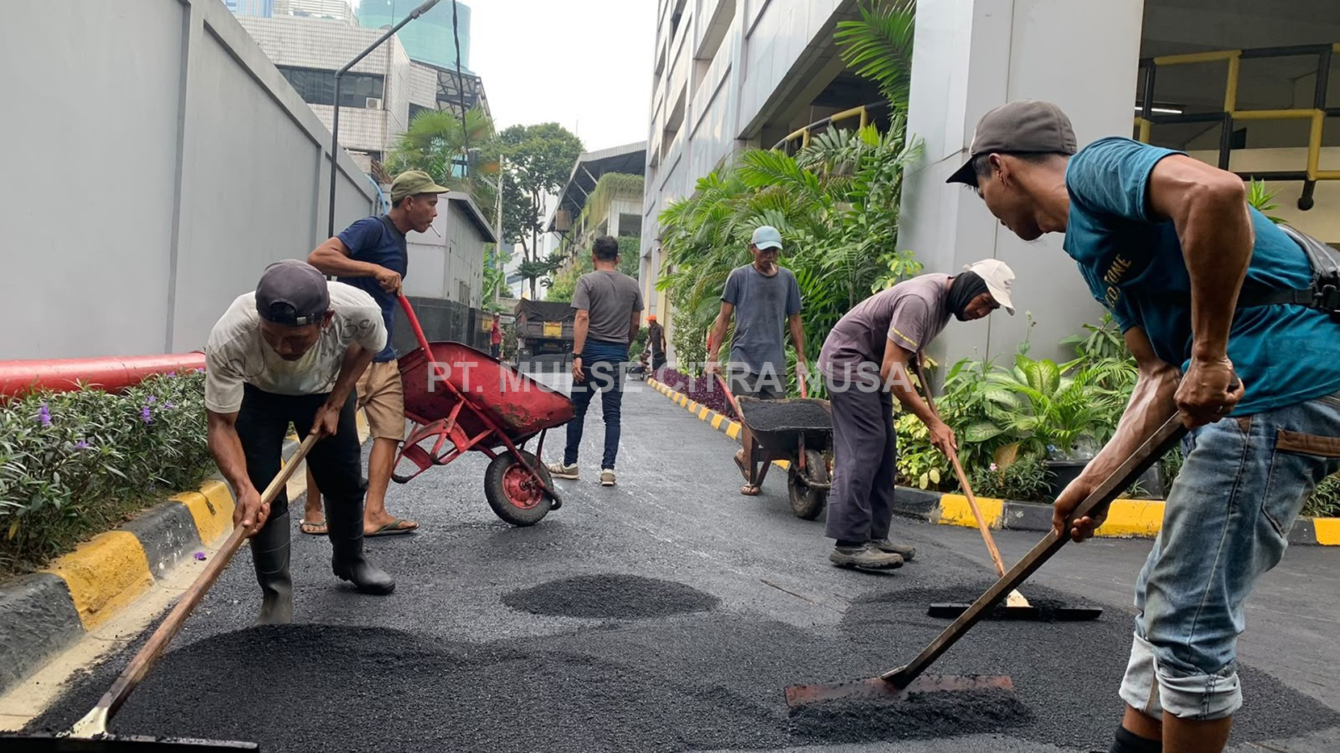 Pengaspalan Akses Jalan